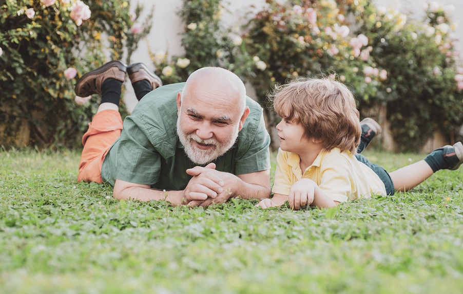 family-summer-active-holidays-cute-child-boy-hugging-his-grandfather-happy-senior-man-grandfathe.jpg